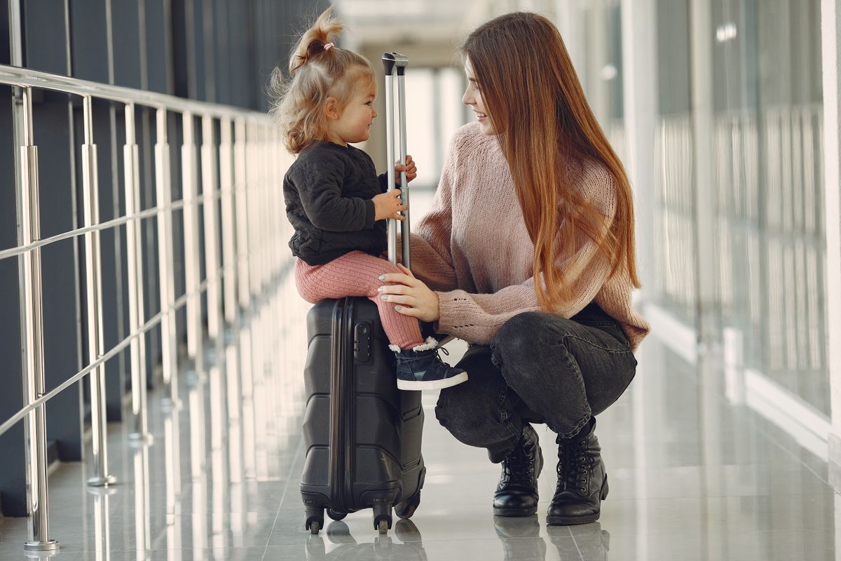 Family travelling through an airport