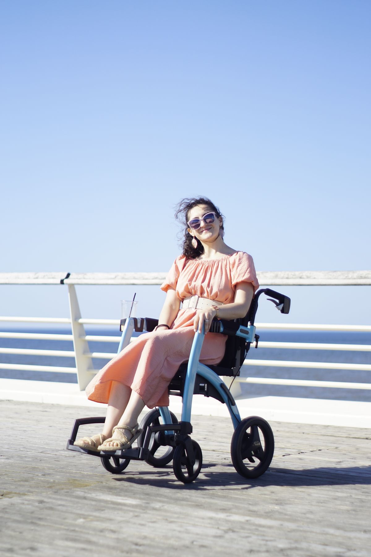 Wheelchair user by a waterfront